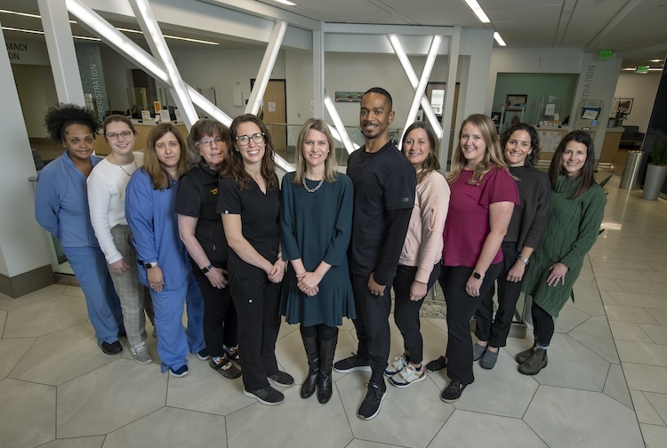 Group standing together outside of a clinic