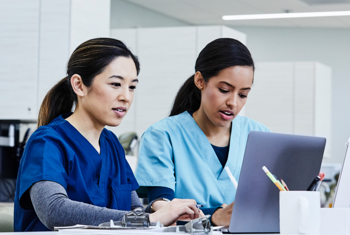 Two nurses with laptop