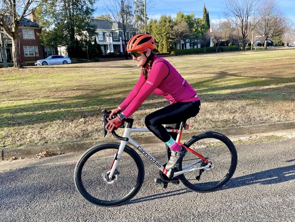 Woman riding her bicycle on a street