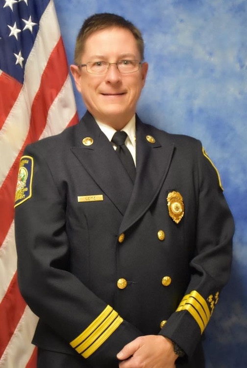 Greg Leitz poses for his professional headshot for the fire department