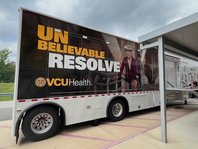 Large trailer with VCU Health logo on the side of it.