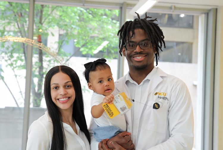 Doctor with fiancé and daughter
