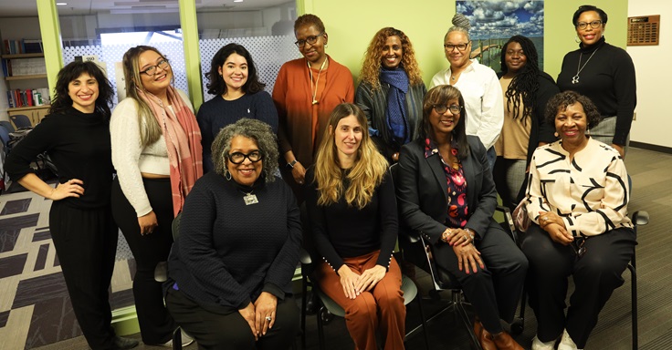 Researchers and participants from the Sisters Informing Sisters research program pose as a group.